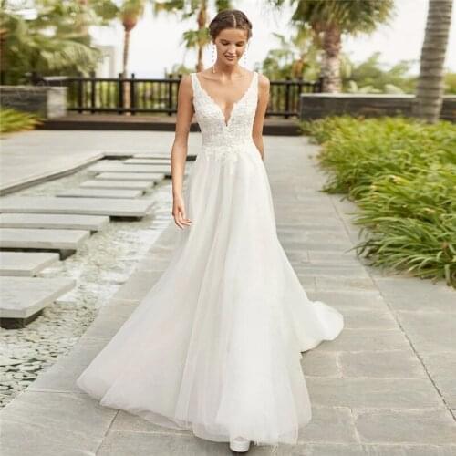 Charming V Neck Wedding Dresses 2021 Sexy Sleeveless Lace Applique Backless A Line Wedding Bride Gowns Women Tulle Bridal Dress