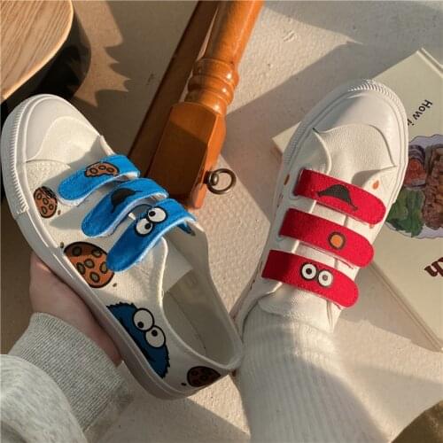 New style ghost horse canvas shoes cute cartoon color matching low-cut womens shoes trend street shooting mandarin duck shoes