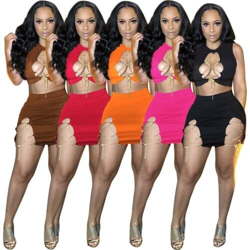 Sexy Criss-Cross Lace Up Skirt Set Woman Sleeveless Hollow Out Crop Top And Sheath Mini Skirts 2 Piece Set Night Club Outfits