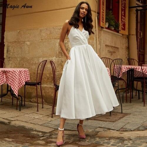 Magic Awn Modest Satin Wedding Dresses 2021 Tea Length Spaghetti Straps Vintage A-Line Bridal Gowns With Pockets Robe De Mariage