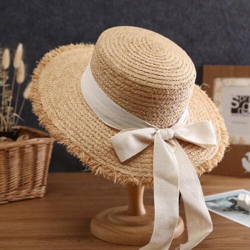 New 2021 summer sun hat bow 100%Raffia hat Visor Temperament flat Straw hats Womens Sea beach vacation leisure sunscreen hats