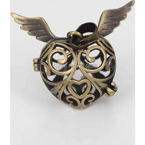 Vintage Bronze tone Filigree Hollow Angel Wings Love Cage Locket Pendants For DIY Essential Oil Diffuser Perfume Chime Necklace