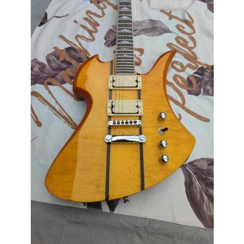 Special shaped Flame Maple six string electric guitar, our shop can customize any type of electric guitar and electric bass Spe