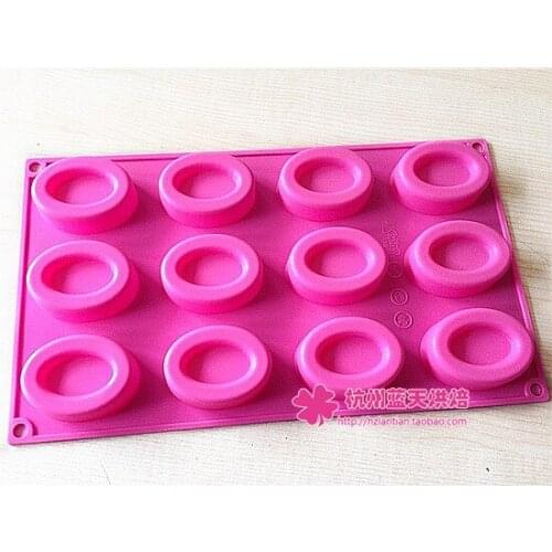Wholesale ,free shipping ,Silicone 12 hole oval Schocolate Mould pudding Mold
