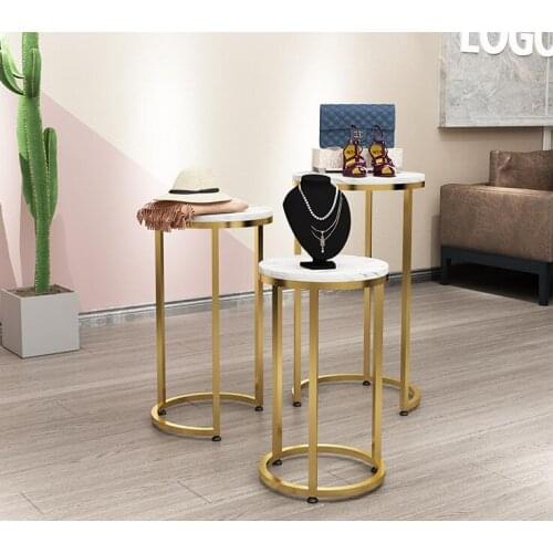 Scandinavia small round table high and low combination clothing and shoes shop window display rack shop middle water table metal