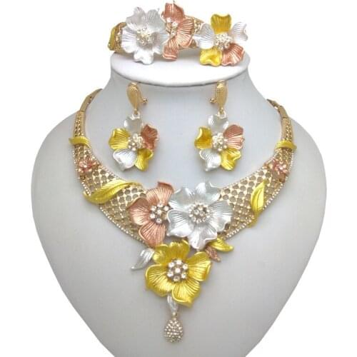 Kingdom Ma 2021 Hot Ethnic Bride Crystal Flower Earring Ring Jewelry Sets Fashion Gold Necklace For Women Boho Jewelry Wholesale