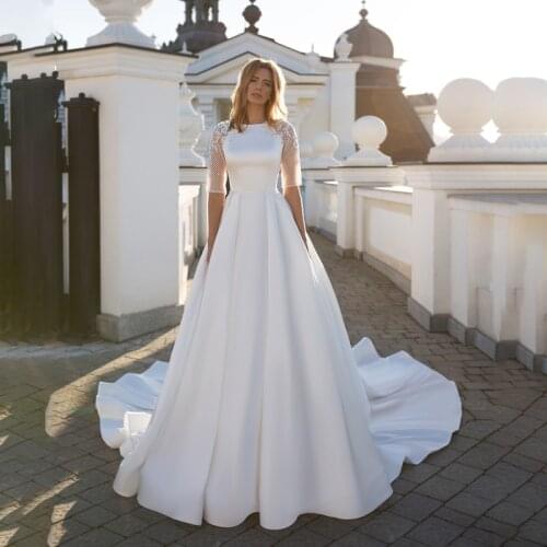 Vintage Jewel Short Sleeve Open Back Satin A Line Wedding Dress New Design Beaded Summer Beach Bridal Gowns Robes De Mariage