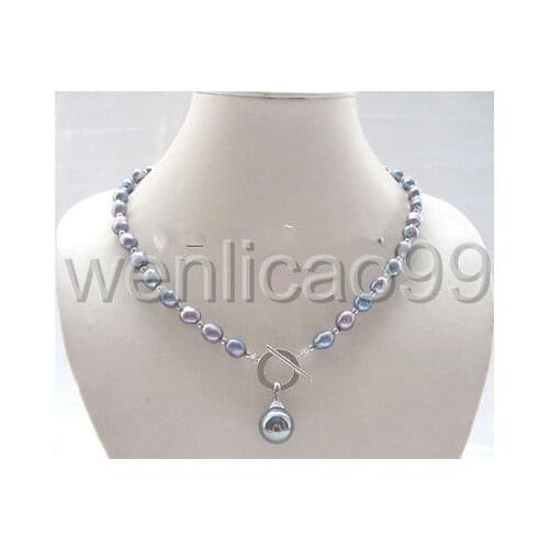 Rice White Akoya freshwater Cultured Pearl/Green Jade Cross pendant necklace