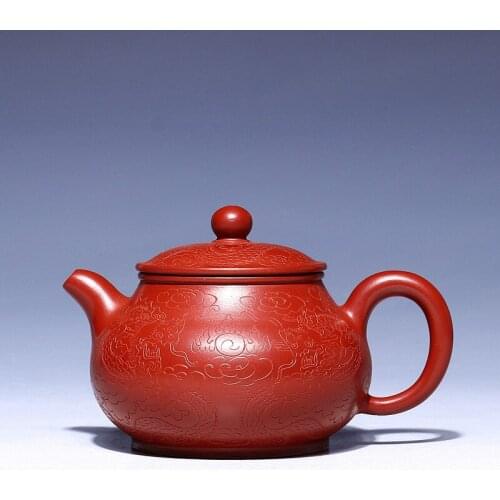 Boutique wholesale handmade ceramic tea-pot undressed ore dahongpao zhu mud sovereign pot pan dragon decorative surface