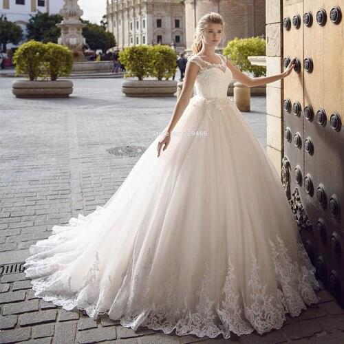 Wuzhiyi empire wedding dress O neck illusion vestido de noiva backless zipper back robe de mariee lace wedding gowns Custom made