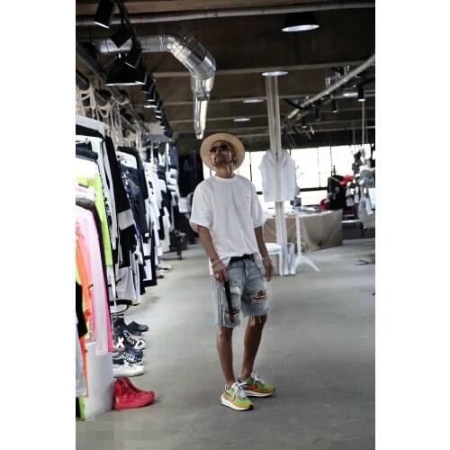 Korean version of the summer mens new spray paint beggar big hole do old fashion jeans shorts personality hip-hop High Street