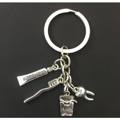 Creative tooth keychain toothbrush toothpaste alloy keychain exquisite dental care doctor nurse keychain