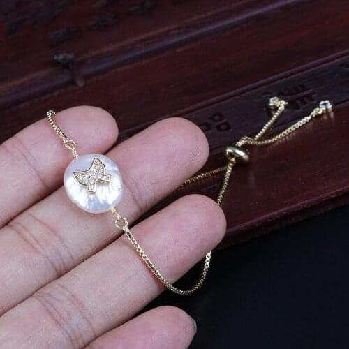 Multi color cz pave tie knot pattern charm natural flat freshwater pearl bead link bracelet for women wedding birthday gift