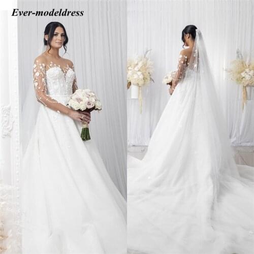 2021 Sexy Lace Wedding Dresses Sheer Neck Illusion Back Vestidos De Novia Long Sleeves Bridal Dress Appliques Floor Length Gowns