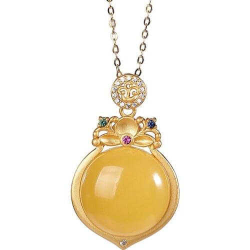 S925 sterling silver gold-plated natural amber wax pendant retro personalized drop-shaped womens necklace pendant