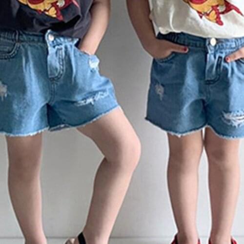 Western style boys and girls street ripped raw edge denim shorts 23D267