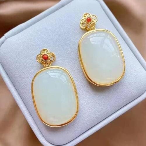 New silver inlaid with natural Hotan white jade Chinese style retro charm minority design light luxury womens brand jewelry