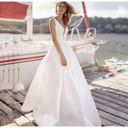 Elegant Long Satin V-Neck Wedding Dresses with Pockets A-Line V-Back Ivory Robes De Mariée Bridal Gown For Women