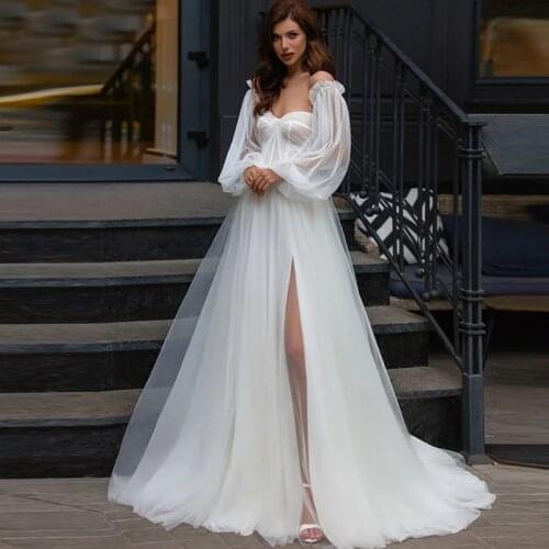 2021 Summer Beach Ivory Wedding Dresses Side Slit Sweetheart Wedding Gowns wth Off Shoulder Long Sleeves Open Back Sweep Train