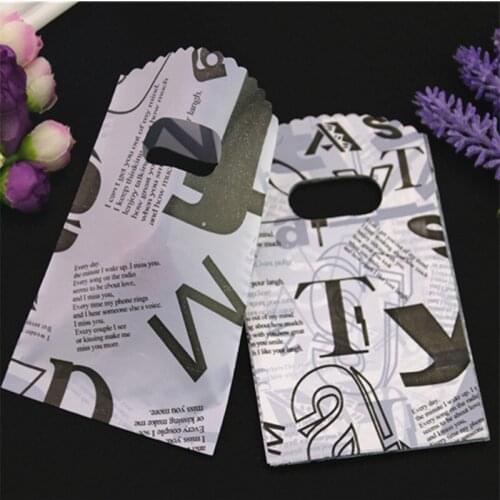 2021 New Design High Quality Wholesale 100pcs/lot 9*15cm Luxury Fashion Plastic Shopping Bags With Handles Small Packaging Bags