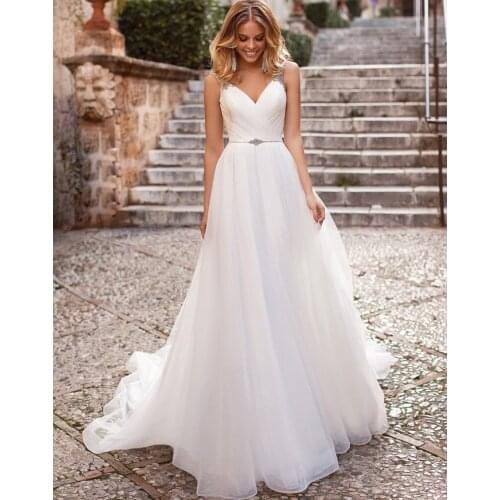 Floor Length Lace Appliques Sweep Train Long Sleeve V-Neck Wedding Dress Backless Backless Bridal Gowns Stunning High Quality