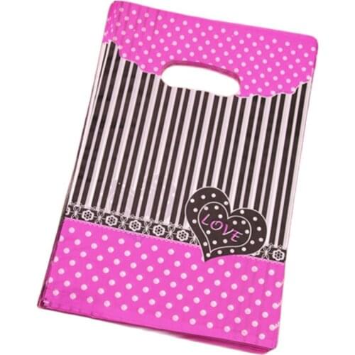 2017 New Style Wholesale 100pcs/lot 20*30cm Luxury Pink Plastic Birthday Supply Packing With Heart Christmas Gift Packaging Bags