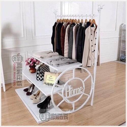 Display. The clothing racks display shelf. Console, wrought iron clothes rack