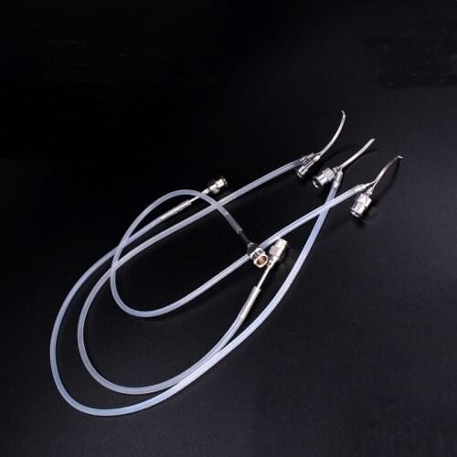 Injection and suction needle, double parallel tube injector, 12 o'clock or so, ocular lacrimal duct cleaning