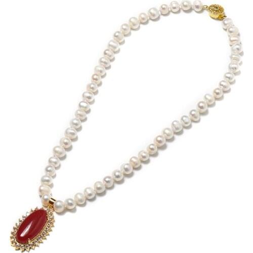 Having a saffron Oval 24*40*10 MM Pendant with golden edges and pure white pearls 8-9 MM Freshwater Natural Pearl Necklace