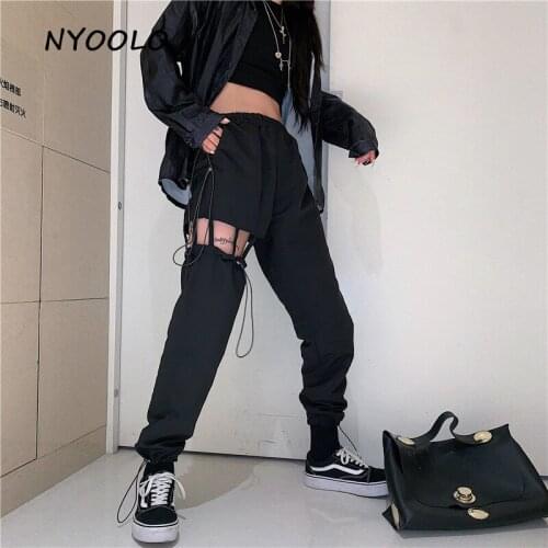 NYOOLO Novelty style hollow out hole cargo pants Casual elastic waist full length hip hop dance pants women clothing streetwear