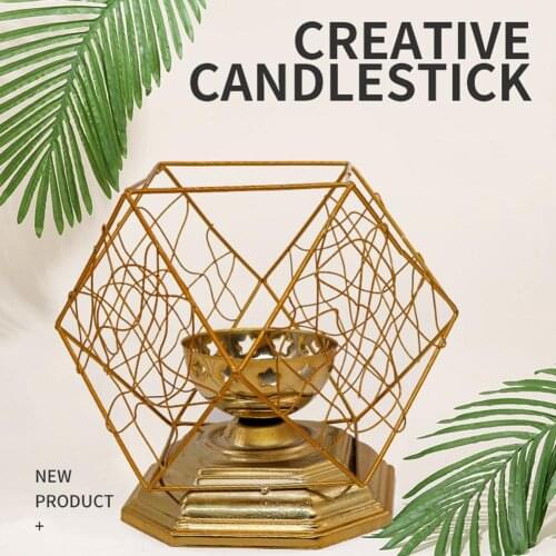 Iron Geometric Frame Candle Holder Candlestick Home Shop Party Table Ornament is a solid bottom cup for the placement of a candl