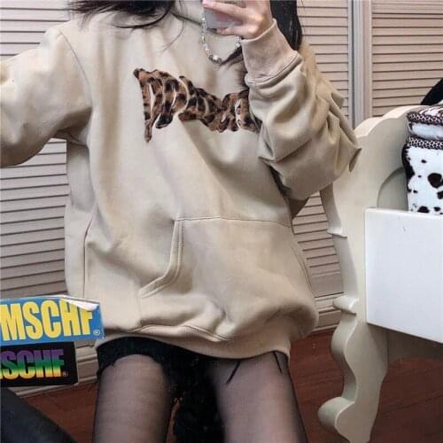 In 2021, the latest autumn and winter loose plus velvet hooded sweater top female student tide
