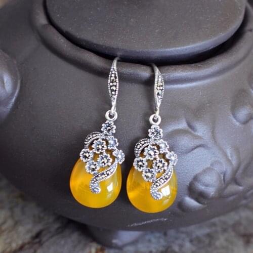 KJJEAXCMY fine jewelry S925 silver yellow Agate Earrings archaize fashion silver ear tag new lady