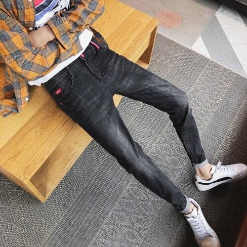 Black denim jeans mens 2021 spring and autumn new Korean style feet pants trendy stretch casual pants mens pencil trousers