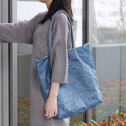 Womens Shoulder Bag Retro Kraft Paper Waterproof Shoulder Bag handbag folds leisure big thin Dupont paper shoulder Tote Female