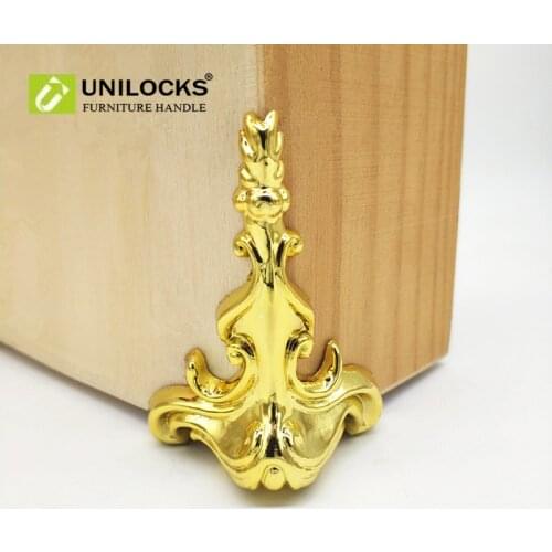 UNILOCKS 52Pcs 65mm*42mm Wood Box Gold Feet Leg Corner Protector Triangle Decorative Bracket For Furniture Hardware Plastic