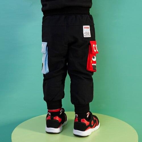 Spring new boys and girls elastic cotton trousers trousers baby cartoon printed casual pants Korean version