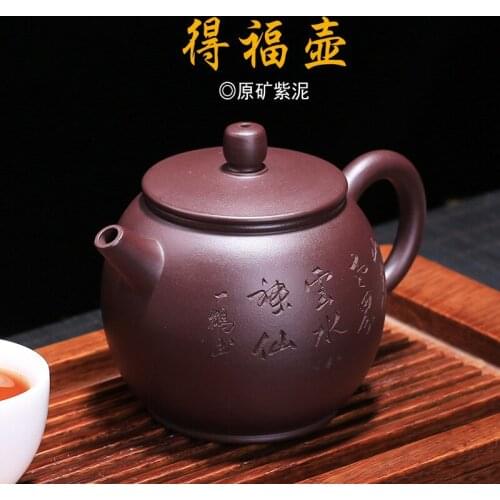 Wang Zhenxue, a purple clay craftsman of Yixing Ore Mine, is a proxy for high-grade teapots