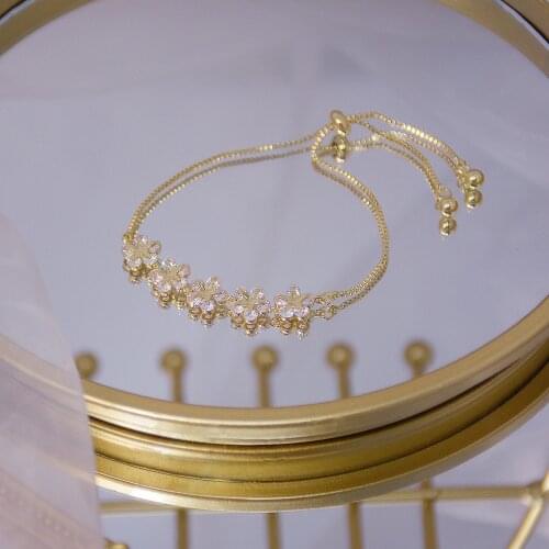 Korean hot selling fashion jewelry luxury copper inlaid zircon flower female stretch adjustable shiny bracelet