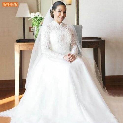 Muslim Long Sleeves Wedding Dresses Dubai Lace Appliqued Africa Church Ivory Bridal Dress 2020 Fluffy Arabic Wedding Gowns White