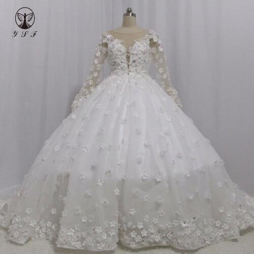 Arabian Design Bridal Gown O Neck Appliqued Beaded Beaded Golden 3D Flowers Sexy Back Long Sleeve Wedding Dresses