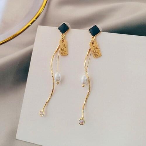 Japanese and Korean version of simple long spiral tassel earrings Hong Kong style pearl earrings wild earrings