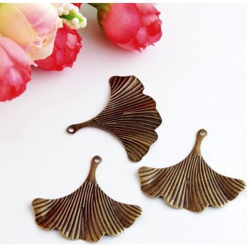 MIAOCHI 100Pcs Antique Bronze Filigree Leaf Metal Crafts Decoration DIY Findings 37x33mm J3103