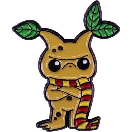 Mandrake Pin with Hufflepuff Scarf They may look rather grumpy, but they're the sweetest, most lovable root you'll ever meet