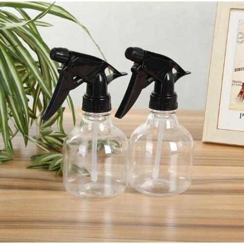 Hand-pressed small transparent sprinkling kettle for flower sprinkling garden holding sprayer