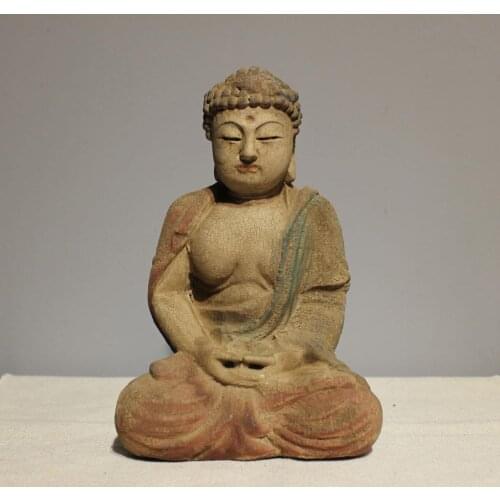 Wooden buddha statue