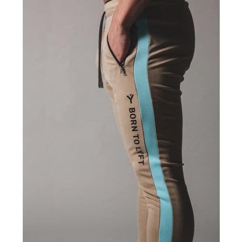 LYFT2020 new color matching sports stretch trousers mens sports fitness casual pants trousers zipper stitching foot pants