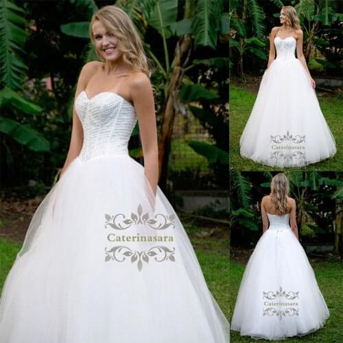 Ball Gown Strapless Wedding Dresses Floor Length Beaded Bride Gowns Sweetheart Neckline with Pearls for Girls Grassland Party