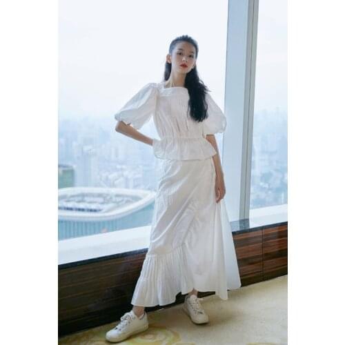 2021 summer new solid color stitching new square neck Bubble Sleeve Top + irregular skirt