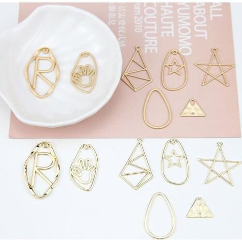 DIY handmade jewelry accessories K gold irregular geometric hollowed out pentagonal star alloy pendant ear decoration material